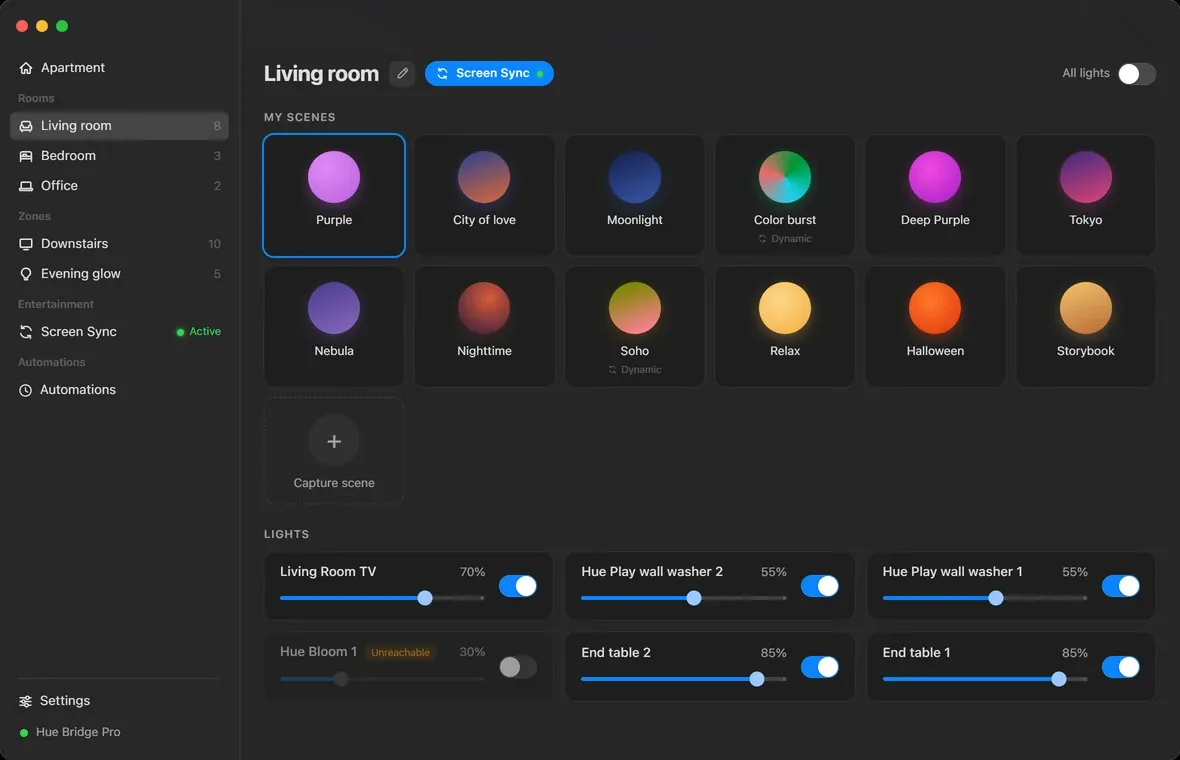 A room in Hue Sync: a grid of scene orbs with a Capture scene tile, above the individual lights with their own sliders